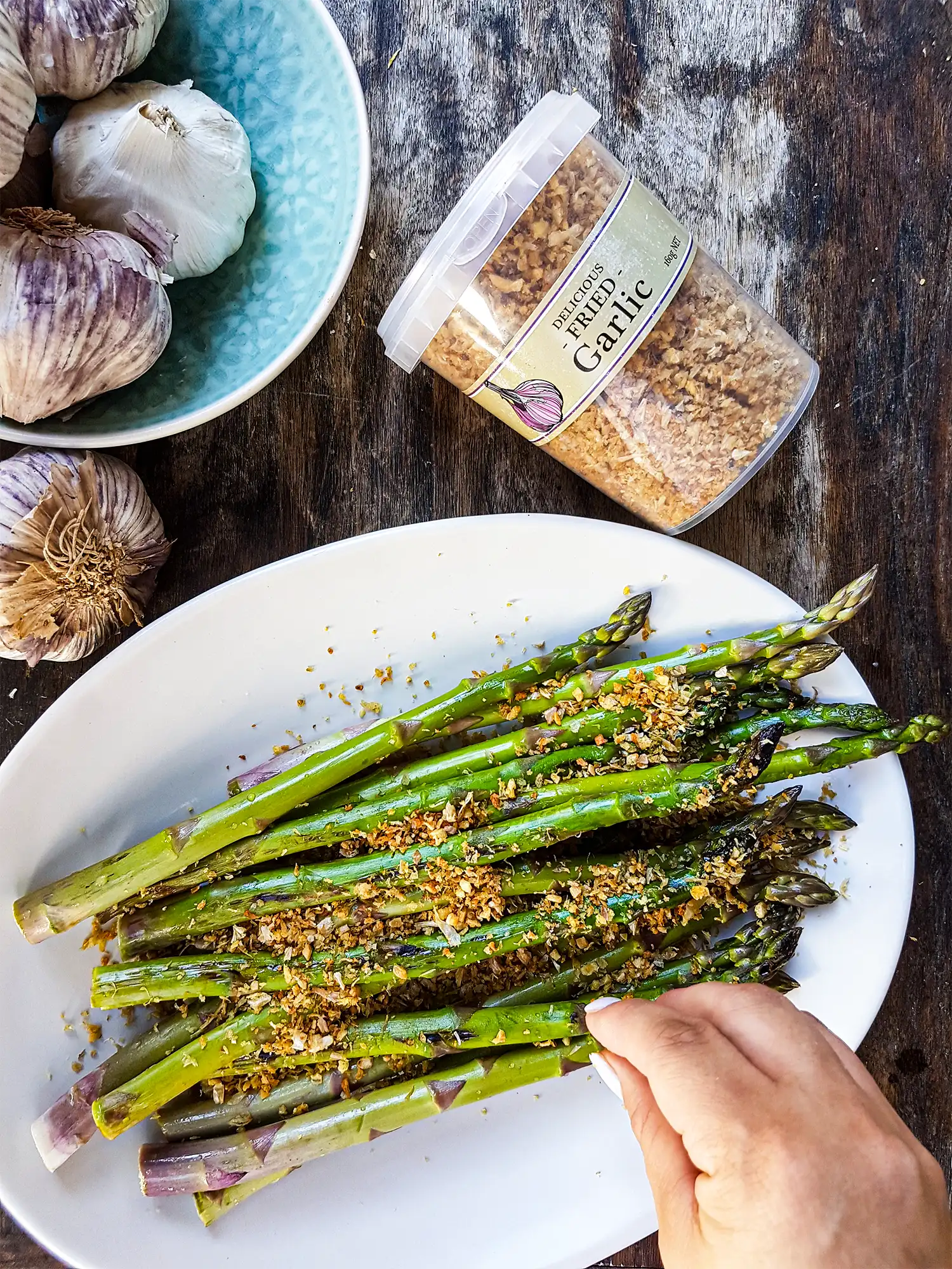 garlic topper over asparagus