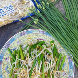 Stir fry garlic chives flower with bean sprouts